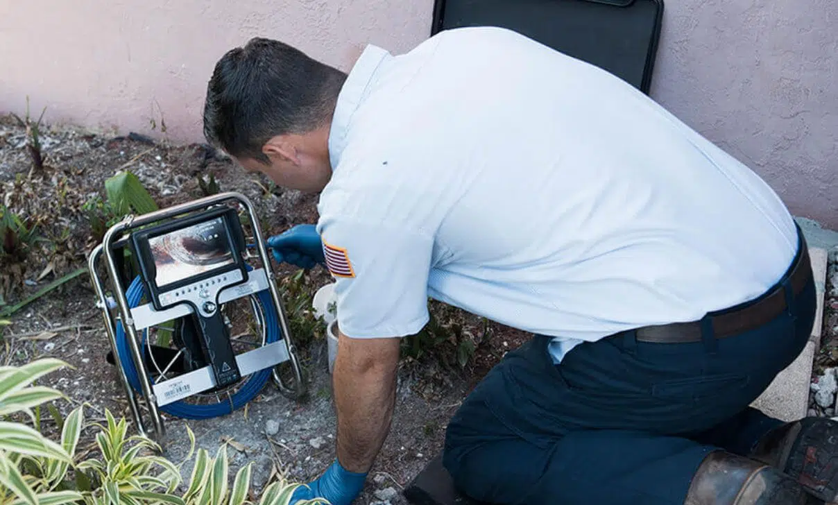 Man Doing Sewer Video Inspection