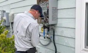 Plumber Fixing Water Heater
