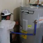 Plumber Checking Water Heater