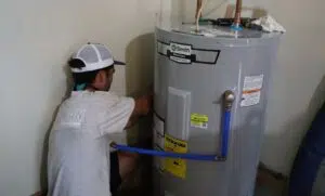 Plumber Checking Water Heater