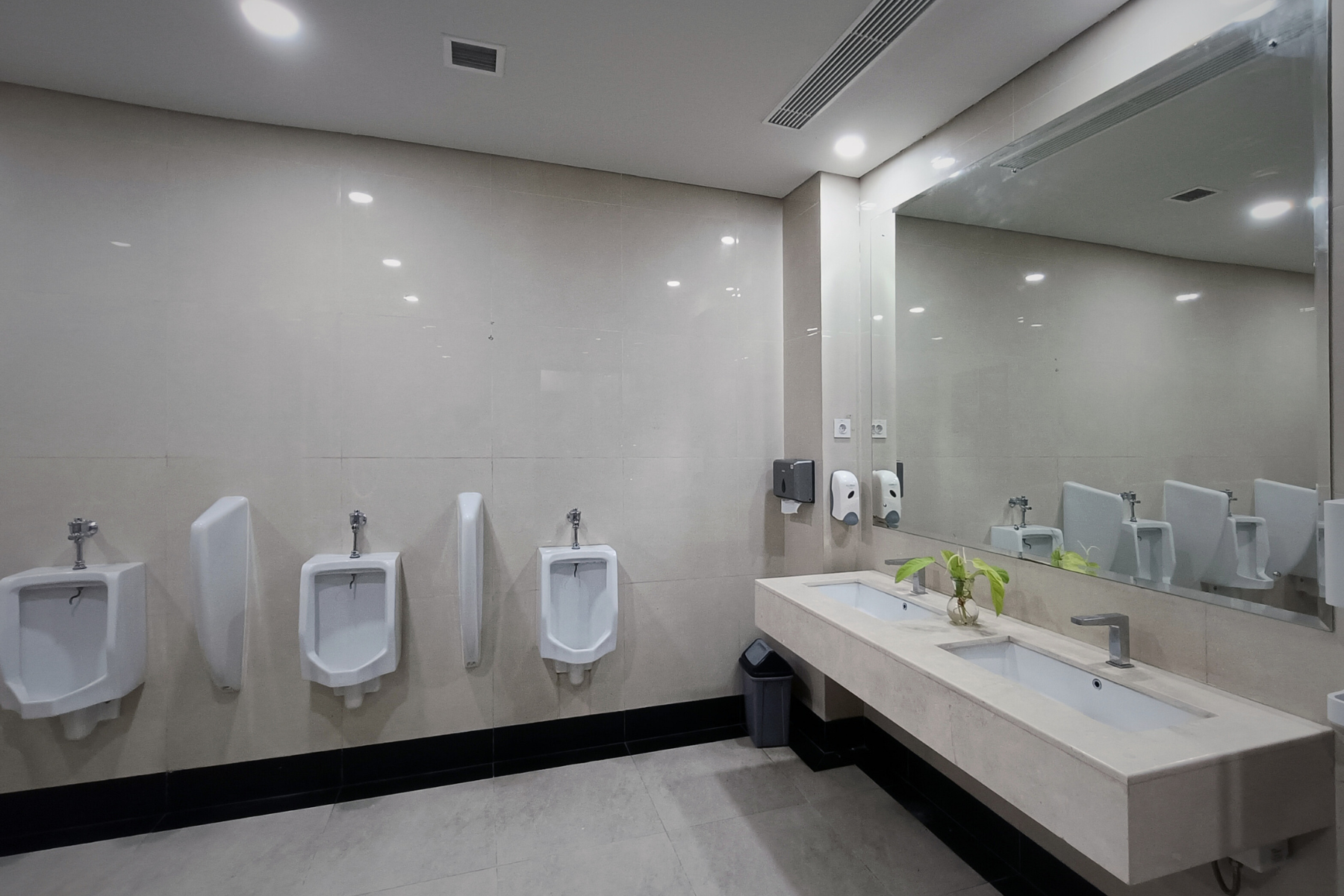 Commercial building undergoing renovation in Charleston SC with temporary restroom rental solution on site