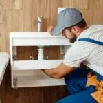 Plumber doing repair