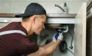 Plumber doing repair